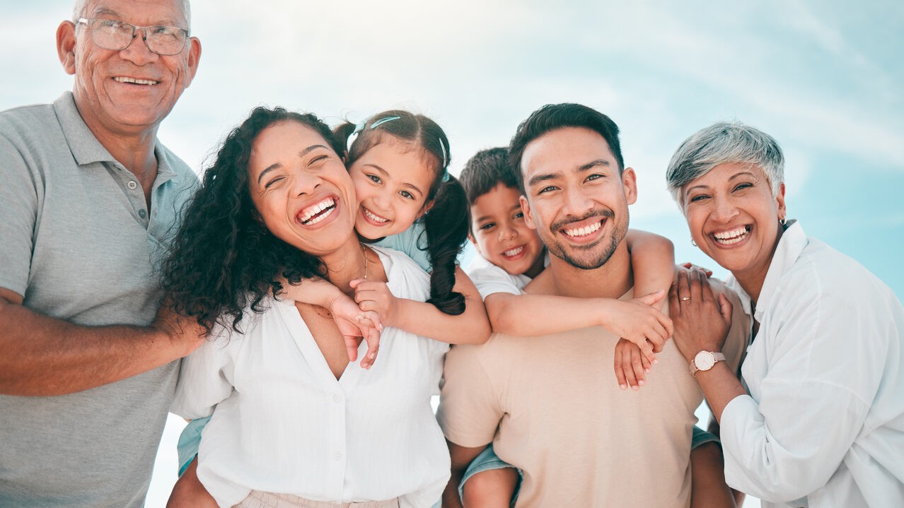 A family of multiple generations that have beautiful, healthy skin because they visit the dermatologist.